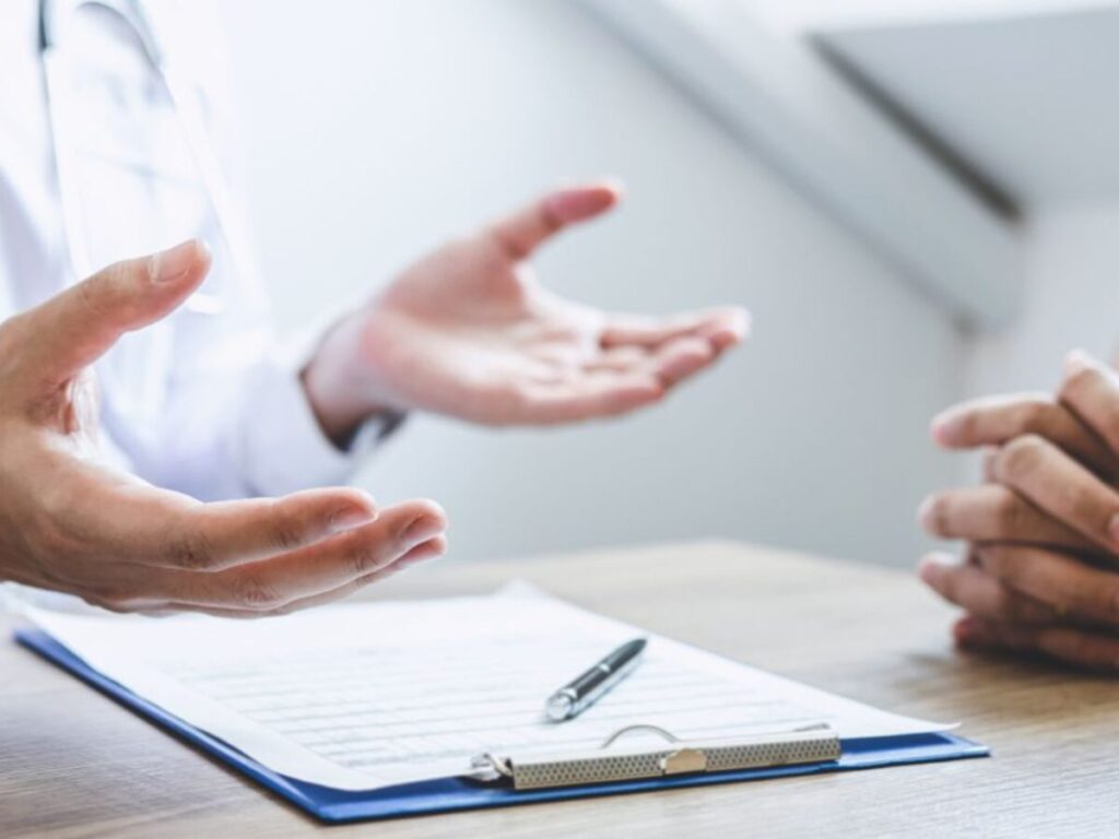 doctor having conversation with patient while disc 2022 11 17 06 05 38 utc 1200x900